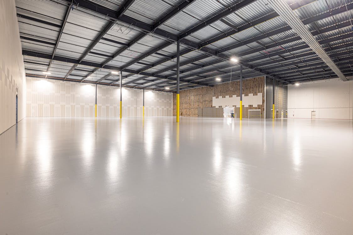 Modern warehouse interior with industrial overhead lighting